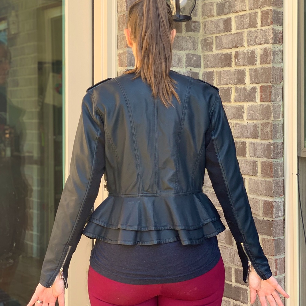 Black Leather peplum zippered jacket. Worn once.